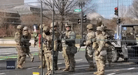 Troops Clear Way for President Biden's Motorcade Following Inauguration