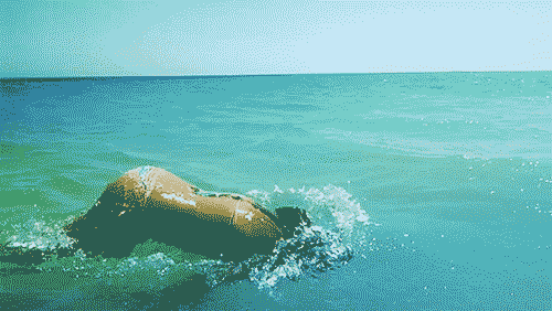 girl swimming GIF