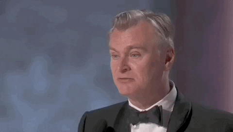 Oscars 2024 GIF. Christopher Nolan wins Best Director for Oppenheimer. He speaks directly to the crowd and says, "It means the world to me. Thank you very much."
