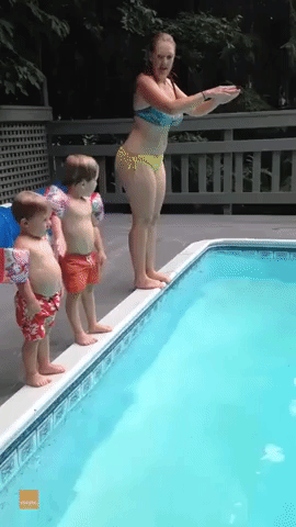Child Performs Spectacular Belly Flop Into Pool