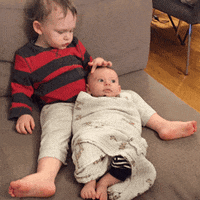 shwirtz baby head spa massage GIF