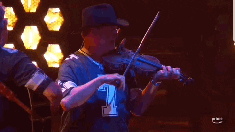 ACM Awards gif. Man playing viloin leans back and forth. 