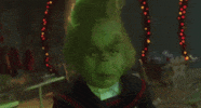 Movie gif. John Ryan Evans as Young Grinch in How The Grinch Stole Christmas rolls his eyes while he’s at school. 