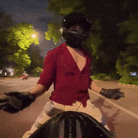 Pointing Biker GIF