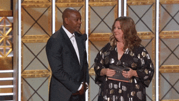 Melissa McCarthy and Dave Chappelle Holding it Together