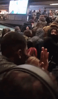 Crowd Rushes From Train Station During Explosion