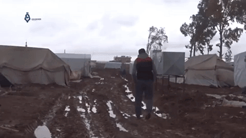 Deep Mud Swamps Camp In Zayzun, Syria, for Displaced Persons