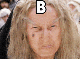 Movie gif. An ancient woman in The Princess Bride looks menacingly ahead as she yells the words that crawl across the gif with unending O's. Text, "Boooooooooo".