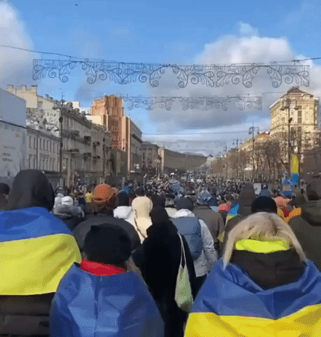 Protesters March Through Kyiv as US Warns Russia Could Invade Ukraine 'at Any Time'