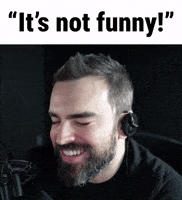 Not Funny Laughing GIF