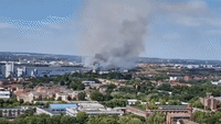 Smoke Rises From Grass Fire in London's Thamesmead