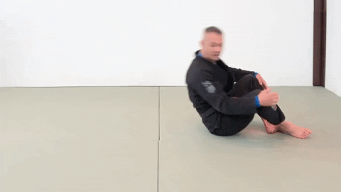 ritchieyip giphygifmaker bjj rocking shoulder rolls GIF