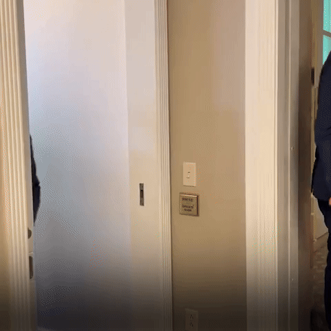 Jungkook walks out of the press conference.