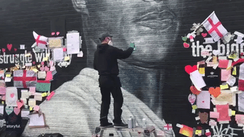 Street Artist Repairs Defaced Marcus Rashford Mural