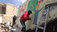 Graffiti Artist Mocks International Response to Alleged Chemical Attack in Khan Shaykhun