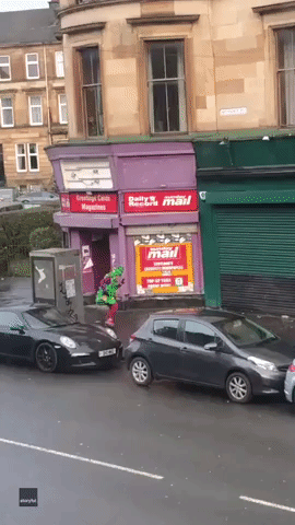 Rocking Around, the Christmas Tree: Woman Dances Along Glasgow Streets Dressed as Festive Conifer