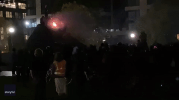 Crowd Cheers as Trump Flag Burns in Seattle