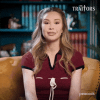 Sponsored gif. Traitors cast member Gabby Windey attempts to look contrite while fighting back a smile and rolling her eyes upward.