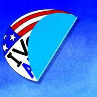 Digital art gif. Oval-shaped sticker adheres to a blue background, featuring the American flag and text, "I voted for abortion rights," in blue and black font.