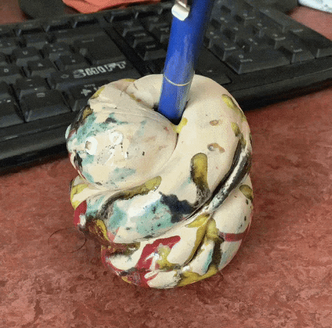 simlol trippy turntable penholder GIF
