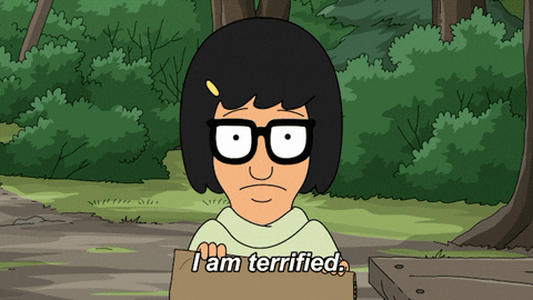 Cartoon gif. Tina on Bob's Burgers holds something in front of herself as she stares blankly and says, "I'm terrified."