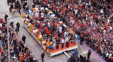 Dusty Baker Waves at Crowd During Astros' Parade in Houston