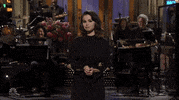 Selena Gomez Shrug GIF by Saturday Night Live