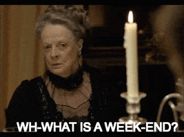 TV gif. Maggie Smith as the Dowager Countess in Downton Abbey looks ahead confused. Text, "What is a week end?"