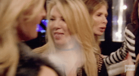 Reality TV gif. Ramona Singer on Real Housewives of New York. She sticks her tongue out and makes a gagging face, indicating how grossed out she is.
