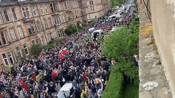 Glasgow Crowd Applauds as Men Detained by Home Office are Released After Protest