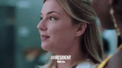 the resident smile GIF