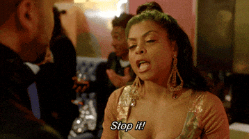 TV gif. Taraji Henson as Cookie Lyon on Empire looks up at a man with a frustrated expression. He snaps all her fingers together in front of his face, almost like she’s grabbing the air, and says, “stop it!”