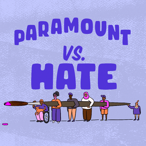 Digital art gif. Big block letters read "Paramount vs hate," hate crossed out in paint, below, a diverse group of people carrying an oversized paintbrush dripping with pink paint.