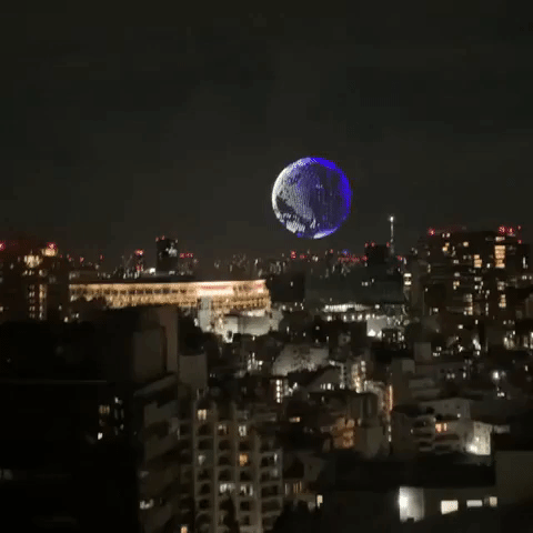 Fireworks, Illuminated Globe Glow Above Tokyo Olympics Opening Ceremony