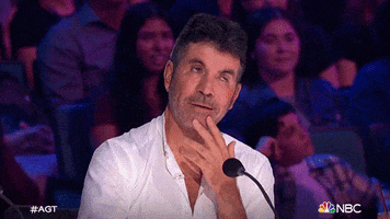 Grinning Simon Cowell GIF by America's Got Talent
