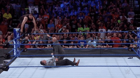 kevin owens pain GIF by WWE