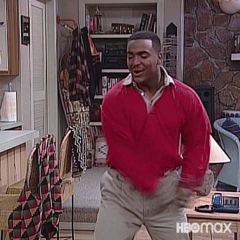 TV show gif. Carlton dances excitedly with moves that are so not cool anymore or ever, wearing a preppy sweater and khaki pants.