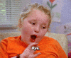 TV gif. Honey Boo Boo tilts her head and flutters her eyes as she looks to the side. She smiles smugly and waves her hand. Text, "Bye."