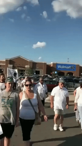 Marchers Gather at Ohio Walmart to Remember Man Shot Dead by Police in 2014