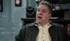 TV gif. Jeff Garlin as Murray in The Goldbergs. He looks confusedly at someone with his jaw hanging open. He continues to look around, leaving his mouth open, and looks absolutely perplexed.