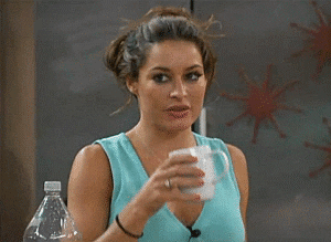 Reality TV gif. A contestant from Big Brother 17 is drinking a cup of water and bursts out laughing mid-sip. She sprays her water all over the counter and can't hold her laughter in, putting the cup down and backing away while laughing.
