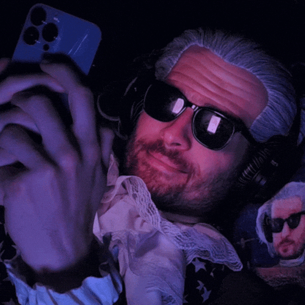 Look At Phone Smiling GIF