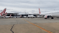 Planes Sit Idle at Melbourne Airport as Coronavirus Grounds Aviation Industry