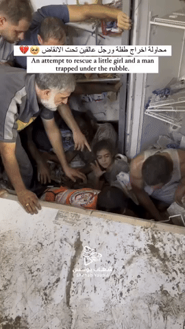 Gaza Residents Work to Pull Man and Girl From Rubble Following Strike