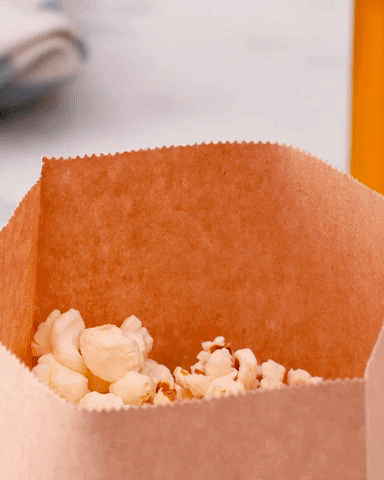 PopcornCentral giphyupload yummy popcorn honey GIF