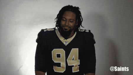 shrugging saints football GIF by New Orleans Saints