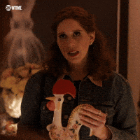 TV gif. Vanessa Bayer as Joanna in I Love That For You. She's holding a rooster statue and looks very serious as she says, "I am really sorry," nodding her head with each word for emphasis.