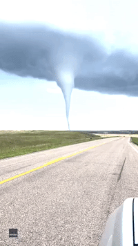 'Mother of God!' Two Large Funnel Clouds Spotted in Tornado-Warned McLean County