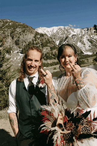 mckenziebigliazzi giphyupload middle finger flip off bride and groom GIF