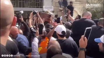 Mourners Pack Mount Zion Cemetery for Slain Palestinian Journalist's Burial